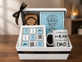 Gift set with mug, father's day chocolates, and bracelet  in a gift box on a wooden surface