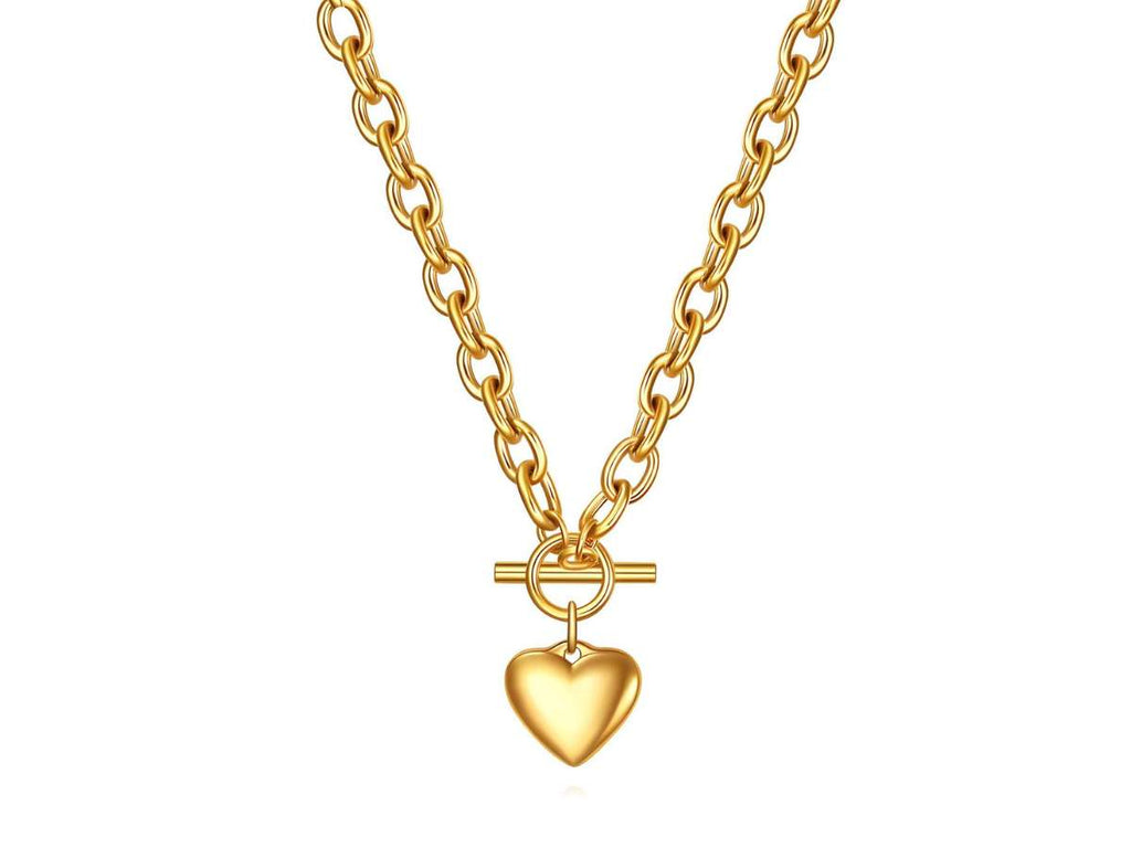 Gold necklace with a heart-shaped pendant on a white background