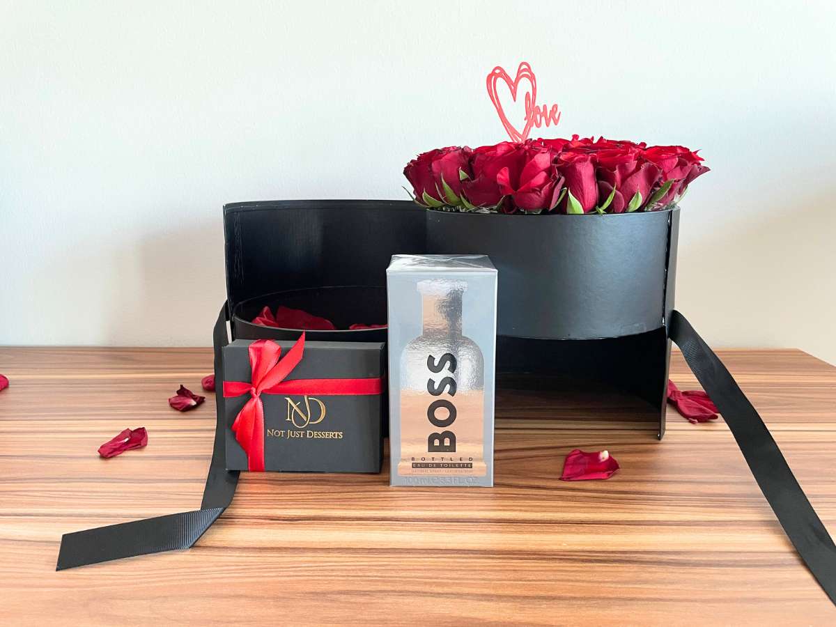 Roses gift for him Dubai | Hugo Boss gift set Dubai | Luxury men gift Dubai | Romantic roses Dubai | Perfume and roses Dubai | Valentine gift for him Dubai | Anniversary gift men Dubai | Premium flower gift Dubai | Men luxury perfume Dubai | Chocolate and perfume gift Dubai | Romantic gift set Dubai | Luxury gifting Dubai
