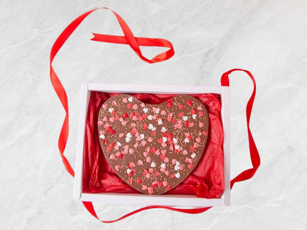 Valentine chocolate Dubai | Belgian chocolate gift Dubai | Luxury chocolate bar Dubai | Handmade chocolate Dubai | Gift chocolate for her Dubai | Romantic chocolate gift Dubai | Chocolate gift box Dubai | Premium milk chocolate Dubai | Valentine’s Day treats Dubai | Chocolate present Dubai | Special occasion chocolate Dubai | Gourmet chocolate Dubai
